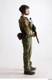 Alex Lee Pose with Gun holding gun standing whole body…